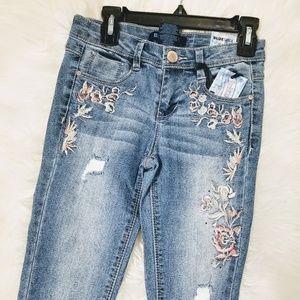 Girls size 8 skinny jeans with applique flowers